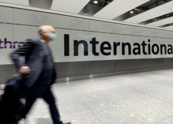 Travel bans from South Africa introduced over mutated Covid variant | Australia stays open