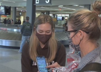 Raleigh family arrives at RDU, describes traveling from South Africa amid COVID-19 omicron restrictions