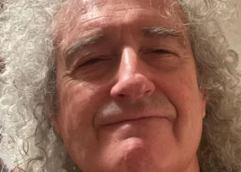Queen guitarist Brian May reveals he is recovering from COVID-19 as Omicron sweeps UK