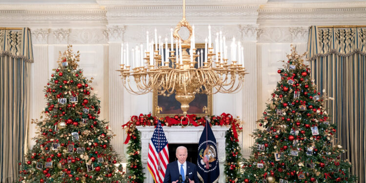 ‘We’re Still in It’: Biden Urges Calm as He Steps Up Omicron Fight