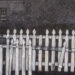 In New Orleans, a White Picket Fence That’s Seen Better Days