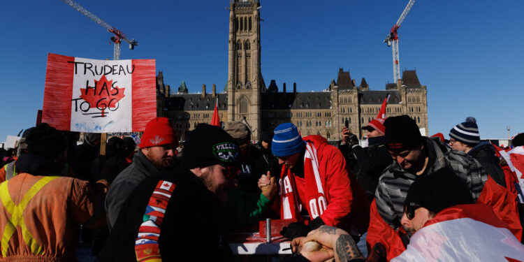 In Canada, ‘Freedom Convoy’ Protesting Vaccine Mandates Nears Capital In Canada, ‘Freedom Convoy’ Protesting Vaccine Mandates Nears Capital