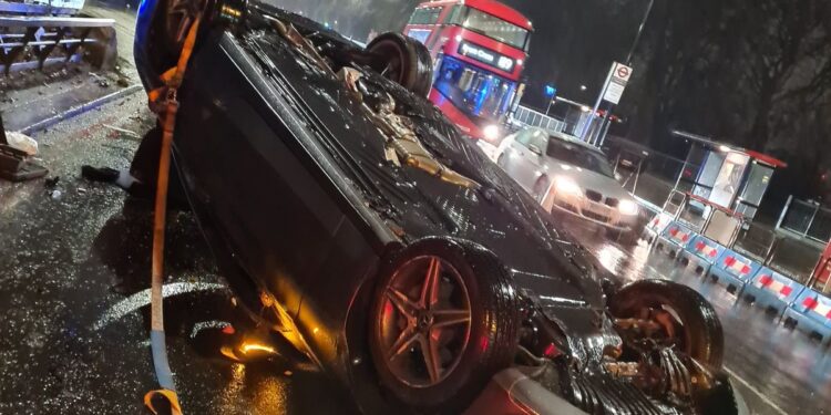 Park Lane road traffic collision leaves car on its roof