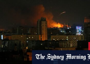 Kyiv surrounded by Vladimir Putin’s troops; Volodymyr Zelensky urges Ukraine citizens to fight, UN, US, UK, Australia announce more Russia sanctions, NSW flood fears rise, NSW rain barrages state,
