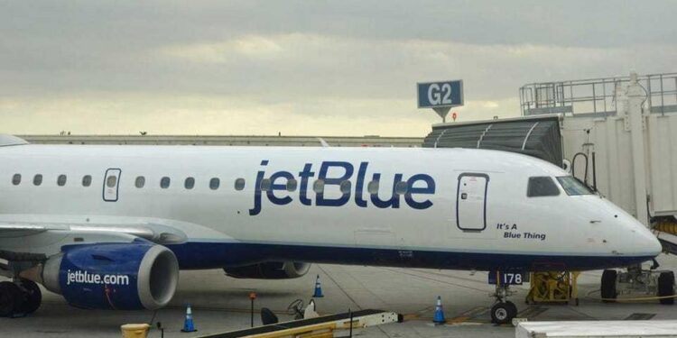 Scores of passengers were trapped on their JetBlue planes and left stranded on the tarmac for hours at JFK airport Scores of passengers were trapped on their JetBlue planes and left stranded on the tarmac for hours at JFK airport