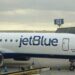 Scores of passengers were trapped on their JetBlue planes and left stranded on the tarmac for hours at JFK airport Scores of passengers were trapped on their JetBlue planes and left stranded on the tarmac for hours at JFK airport