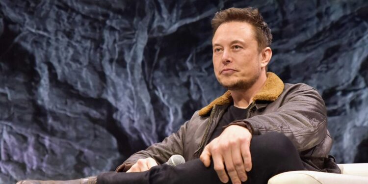 Elon Musk said Berkshire Hathaway’s Charlie Munger once told an entire table at lunch ‘all the ways Tesla would fail’