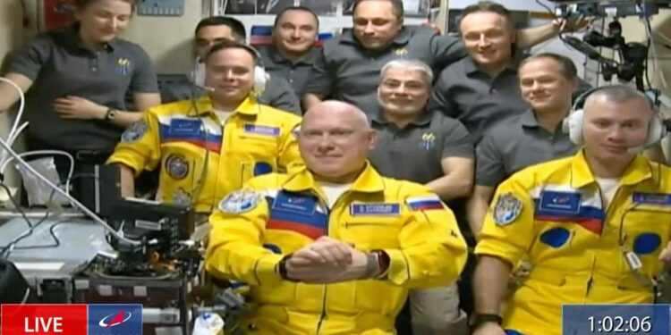 Russian cosmonauts boarded the International Space Station wearing yellow and blue, the colors of Ukraine’s flag, but it might not be the show of support it seems Russian cosmonauts boarded the International Space Station wearing yellow and blue, the colors of Ukraine’s flag, but it might not be the show of support it seems