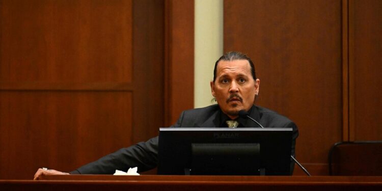 Johnny Depp, at Libel Trial, Denies Ever Striking ‘Any Woman’ Johnny Depp, at Libel Trial, Denies Ever Striking ‘Any Woman’