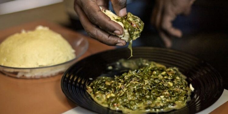 President Kenyatta halves cost of maize flour President Kenyatta halves cost of maize flour