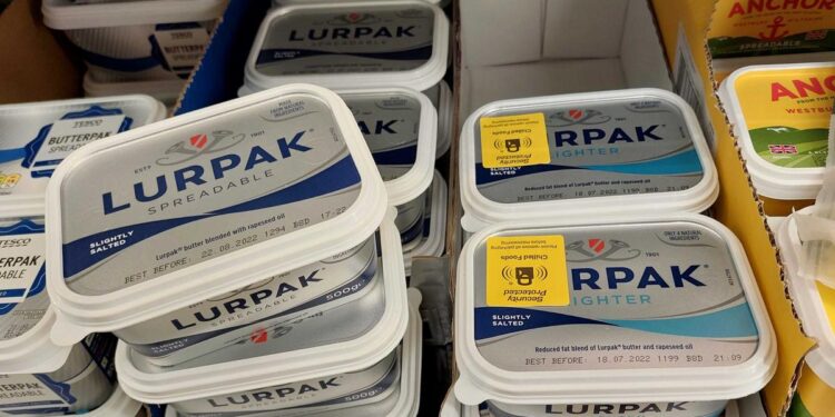 Britain’s biggest supermarket Tesco is putting security stickers on blocks of cheese and butter Britain’s biggest supermarket Tesco is putting security stickers on blocks of cheese and butter