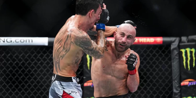 Australia’s Alexander Volkanovski beats Max Holloway to defend featherweight title at UFC 276 Australia’s Alexander Volkanovski beats Max Holloway to defend featherweight title at UFC 276