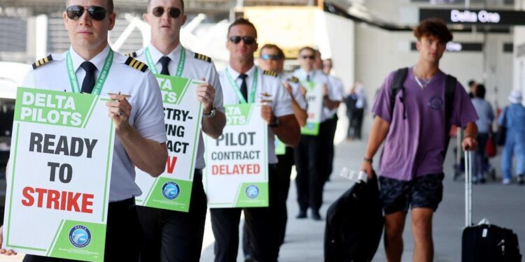Delta pilots warn of ‘the perfect storm’ this holiday weekend as hundreds picketed the airline at hubs across the US Delta pilots warn of ‘the perfect storm’ this holiday weekend as hundreds picketed the airline at hubs across the US