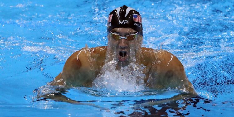 “Webbed Feet…Short Trunk, Tall Torso”: When Michael Phelps’ Supremacy in Swimming Was Detailed by Former American Quarterback “Webbed Feet…Short Trunk, Tall Torso”: When Michael Phelps’ Supremacy in Swimming Was Detailed by Former American Quarterback