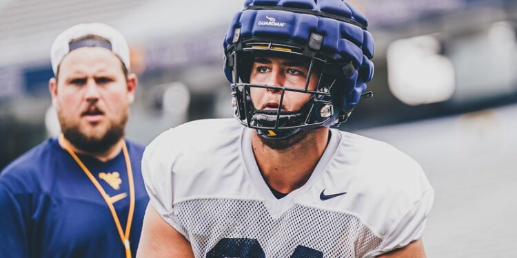 From Throwing Strikes to Freshman All-American OT, Milum Finds a Home on the O-Line From Throwing Strikes to Freshman All-American OT, Milum Finds a Home on the O-Line