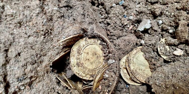 A couple laying a new kitchen floor dug up a trove of 264 rare gold coins that just sold at auction for 5,000