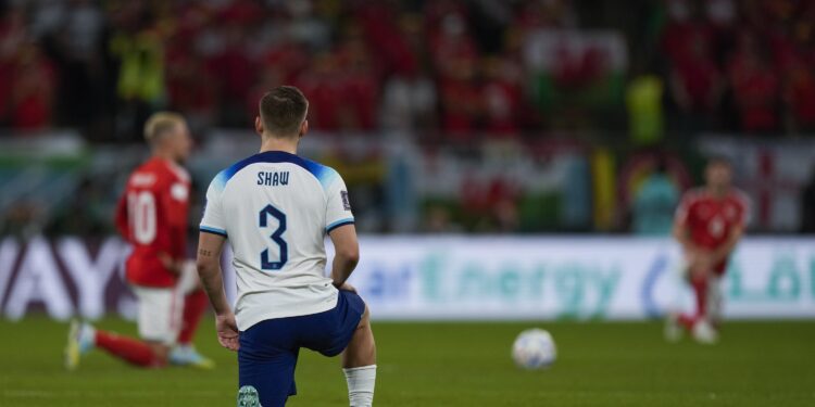 England and Wales players take a knee in World Cup match