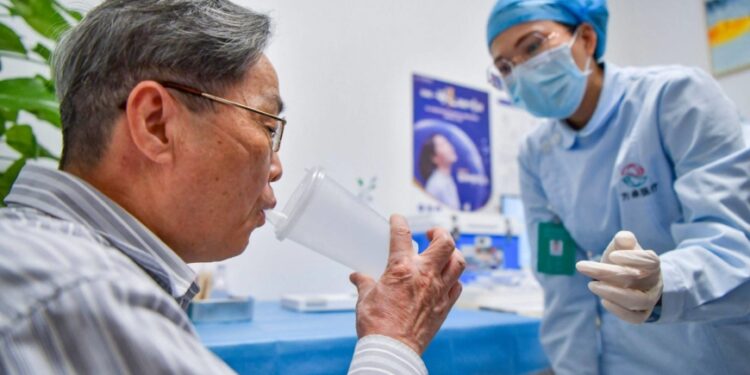 China pushes elderly vaccination as reopening pressure grows
