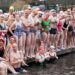 Hardy swimmers take a dip in London’s Hyde Park for Christmas Day swim